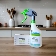 Samba Shine multi-surface cleaning sheets packaging and spray bottle on a kitchen counter.